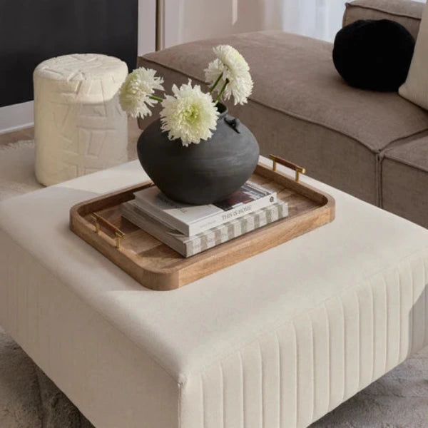 A rectangular wooden serving tray with rounded corners and small metal handles on the left and right sides, shown on a plain white background.