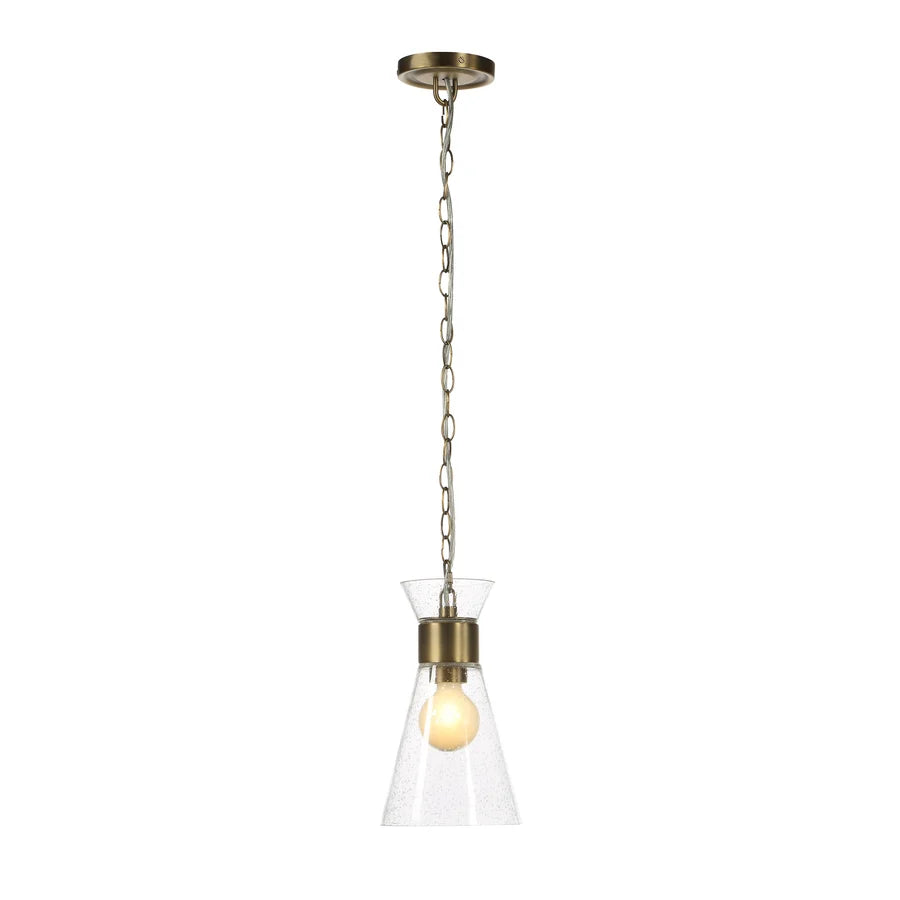 A single pendant light with an antique brass ceiling canopy, chain, and collar, holding a clear textured glass shade and a warm Edison-style bulb, shown against a plain white background.