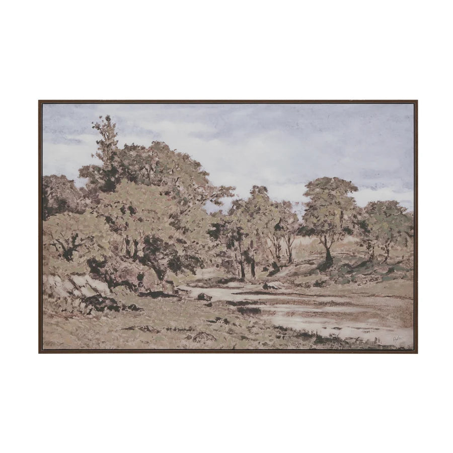 A framed landscape art print depicting a serene, muted-toned woodland scene with trees, grassy terrain, and a pale sky, shown against a plain white background.